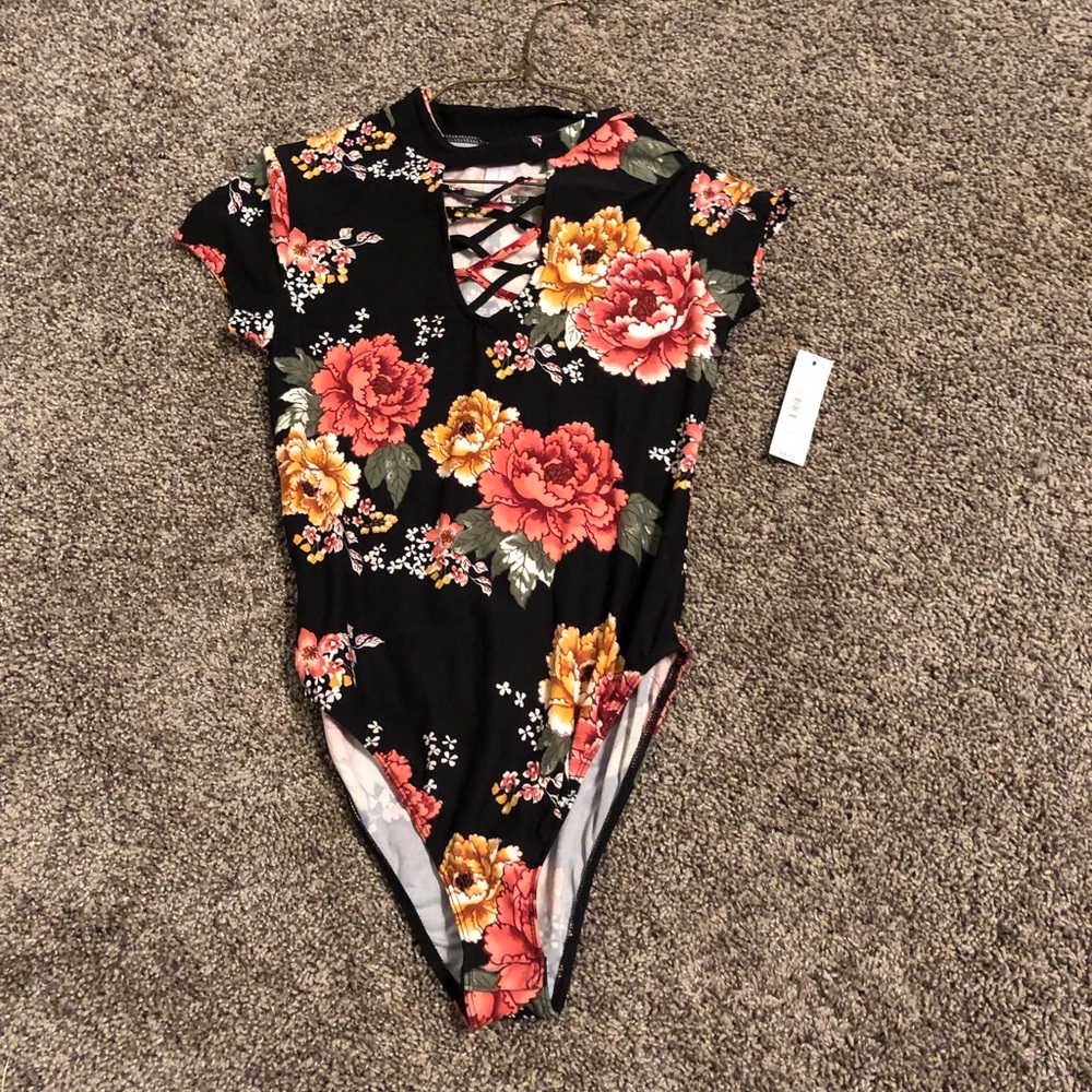 flowered body suit w starps in front